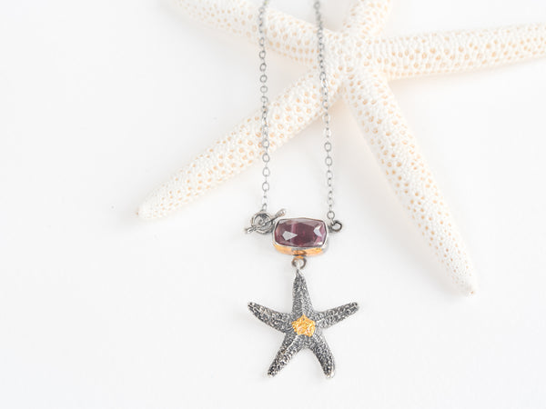 'Eternal Marine Star' silver necklace with Red Tourmaline and a Touch of Gold